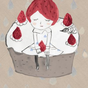 sitting on a strawberry cake